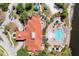 Community pool and clubhouse viewed from above at 112 Paloma Dr, Davenport, FL 33837
