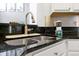 Kitchen sink with granite countertops and modern faucet at 112 Paloma Dr, Davenport, FL 33837