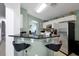 Kitchen with granite countertop and stainless steel appliances at 112 Paloma Dr, Davenport, FL 33837