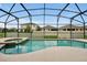 Relaxing pool and spa with covered patio and outdoor seating at 112 Paloma Dr, Davenport, FL 33837