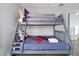 Bedroom with bunk beds and Spiderman bedding at 112 Paloma Dr, Davenport, FL 33837