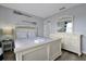Bedroom with a queen bed and coastal decor at 112 Paloma Dr, Davenport, FL 33837