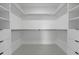 Spacious walk-in closet with ample shelving and hanging space at 6230 Chorus Dr, Mascotte, FL 34753