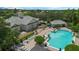 Aerial view of community pool and clubhouse at 6115 Sunset Isle Dr, Winter Garden, FL 34787