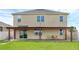 Spacious backyard featuring a patio, pergola, and grassy area at 205 Hamlet Rd, Davenport, FL 33837