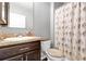 Bathroom with single vanity, toilet and shower/tub combo at 205 Hamlet Rd, Davenport, FL 33837