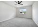 Bright bedroom with ceiling fan and grey carpet at 3228 Sailing Pier Ave, Winter Garden, FL 34787