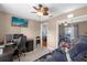 Home office featuring a workspace and exercise equipment at 897 Vicksburg St, Deltona, FL 32725
