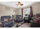 Home office with two comfortable chairs and a workspace at 897 Vicksburg St, Deltona, FL 32725