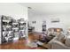 Living room with large windows, and a view into the dining room at 897 Vicksburg St, Deltona, FL 32725