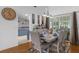 Bright dining room with a large table and access to a patio at 897 Vicksburg St, Deltona, FL 32725