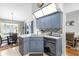 L-shaped kitchen with ample counter space and modern appliances at 897 Vicksburg St, Deltona, FL 32725