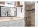 Modern bathroom with a walk-in shower and updated fixtures at 897 Vicksburg St, Deltona, FL 32725