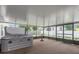Enjoy this screened lanai featuring a hot tub and ample space for relaxation at 897 Vicksburg St, Deltona, FL 32725