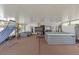 Outdoor patio with hot tub, seating, and TV at 897 Vicksburg St, Deltona, FL 32725