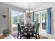 Small dining area with a round table and four chairs at 897 Vicksburg St, Deltona, FL 32725