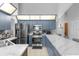 Updated kitchen featuring blue cabinets and marble countertops at 897 Vicksburg St, Deltona, FL 32725