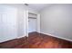 Spacious bedroom closet with double doors and ample storage at 1509 Red Oak Ct, Apopka, FL 32703