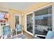 Balcony with patio furniture and ocean view at 3801 S Atlantic Ave # Ut305, New Smyrna Beach, FL 32169