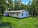 Cute one-story house with a fenced yard at 1129 Crestview Ave, Lakeland, FL 33805