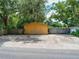 Spacious detached garage with large concrete parking area at 1129 Crestview Ave, Lakeland, FL 33805
