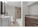 Updated bathroom with granite countertop and wood-look tile at 610 20Th Sw St, Winter Haven, FL 33880