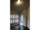 Cozy dining area with sliding glass doors and window shutters at 4559 Oak Arbor Cir, Orlando, FL 32808