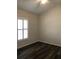 Bright bedroom with window shutters and ceiling fan at 4559 Oak Arbor Cir, Orlando, FL 32808