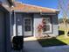 Front view of house, showcasing entrance and landscaping at 4559 Oak Arbor Cir, Orlando, FL 32808