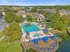 Community pool and spa with plenty of lounge chairs at 2213 San Vittorino Cir # 106, Kissimmee, FL 34741