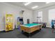 Game room featuring pool table, arcade games, and seating at 2213 San Vittorino Cir # 106, Kissimmee, FL 34741