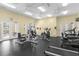 Well-equipped fitness center with various cardio and strength training machines at 2213 San Vittorino Cir # 106, Kissimmee, FL 34741