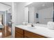 Clean bathroom with a single sink vanity and mirror at 2213 San Vittorino Cir # 106, Kissimmee, FL 34741