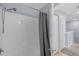 Bathroom with shower/tub combo and gray walls at 2213 San Vittorino Cir # 106, Kissimmee, FL 34741