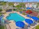 Refreshing community pool with a playground nearby at 2213 San Vittorino Cir # 106, Kissimmee, FL 34741