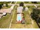 Aerial view showcasing a house with a refreshing pool and a spacious backyard at 8342 Starr Dr, Orlando, FL 32818