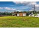 Detached workshop with two garage doors and large yard at 8342 Starr Dr, Orlando, FL 32818