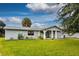 Charming ranch home with a large grassy yard at 8342 Starr Dr, Orlando, FL 32818