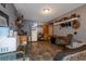 Small kitchen with a refrigerator, microwave, and essential cooking amenities at 8342 Starr Dr, Orlando, FL 32818
