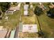 Aerial view of a property featuring a house, large backyard and neighboring houses at 8342 Starr Dr, Orlando, FL 32818