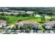 Aerial view showing condo location near a lake and golf course at 14037 Fairway Island Dr # 233, Orlando, FL 32837