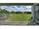 Balcony overlooking green space and trees at 14037 Fairway Island Dr # 233, Orlando, FL 32837