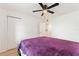 Bright bedroom with ceiling fan and hardwood flooring at 14037 Fairway Island Dr # 233, Orlando, FL 32837