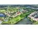 Bird's-eye view of condo community near a lake at 14037 Fairway Island Dr # 233, Orlando, FL 32837
