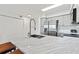 Modern kitchen features stainless steel appliances and marble countertops at 14037 Fairway Island Dr # 233, Orlando, FL 32837