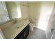 Clean bathroom with a vanity, toilet and mirror at 8502 Arcadia Ln, Davenport, FL 33896