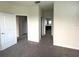 Spacious bedroom with neutral carpeting and ample natural light at 8502 Arcadia Ln, Davenport, FL 33896