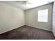 Well-lit bedroom with ceiling fan and neutral decor at 8502 Arcadia Ln, Davenport, FL 33896
