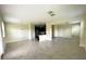 Open floor plan with kitchen, living, and dining areas at 8502 Arcadia Ln, Davenport, FL 33896