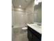 Clean bathroom with tub, toilet and vanity at 8502 Arcadia Ln, Davenport, FL 33896